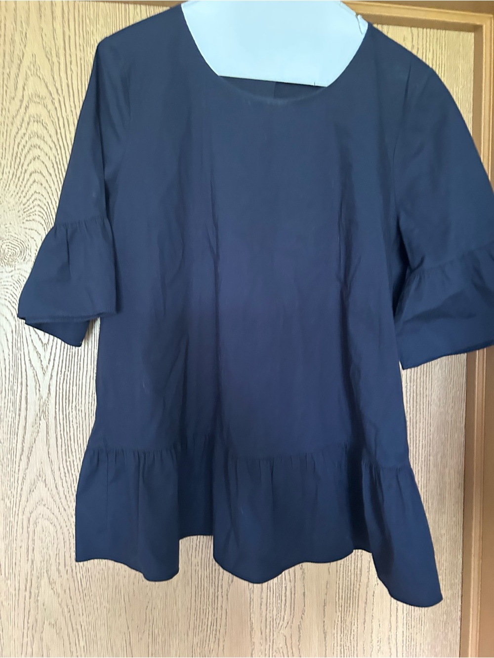 Women's Navy Ruffle Hem Top